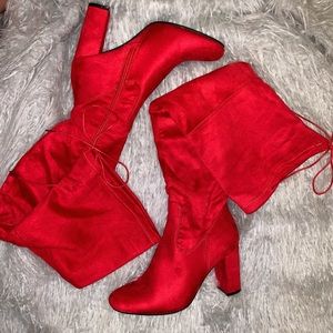 Red thigh high heeled boots